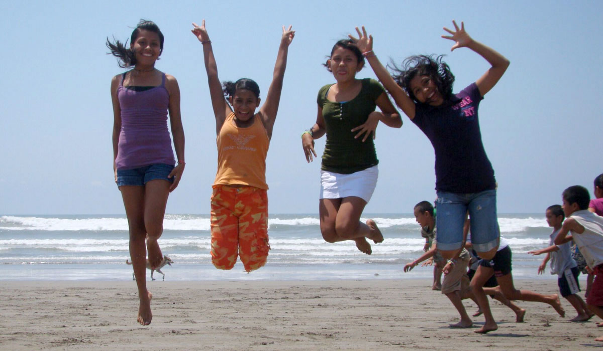 Niñas Jumping on Playa Bonfil - Marsh Children's Home Event