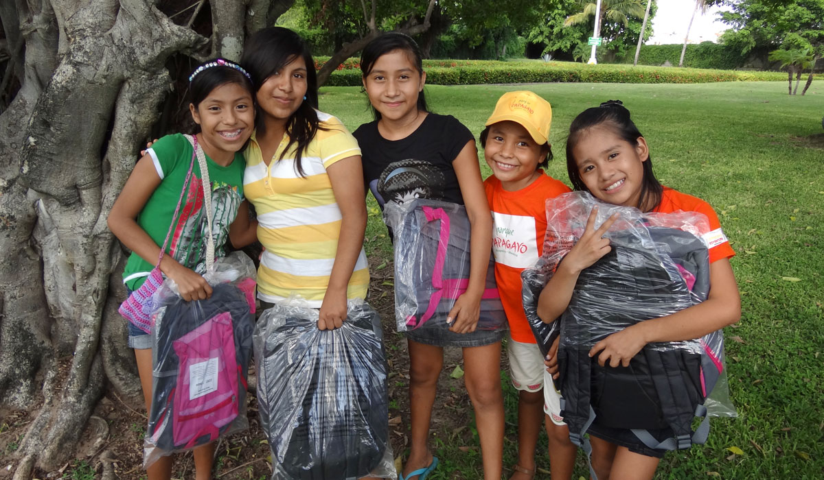 "Las Niñas" with their New Backpacks - Marsh Children's Home Event